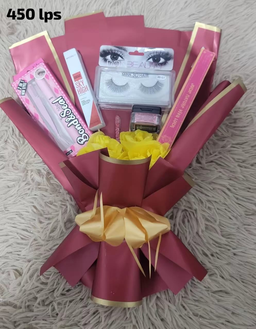 Ramo de maquillaje y perfume